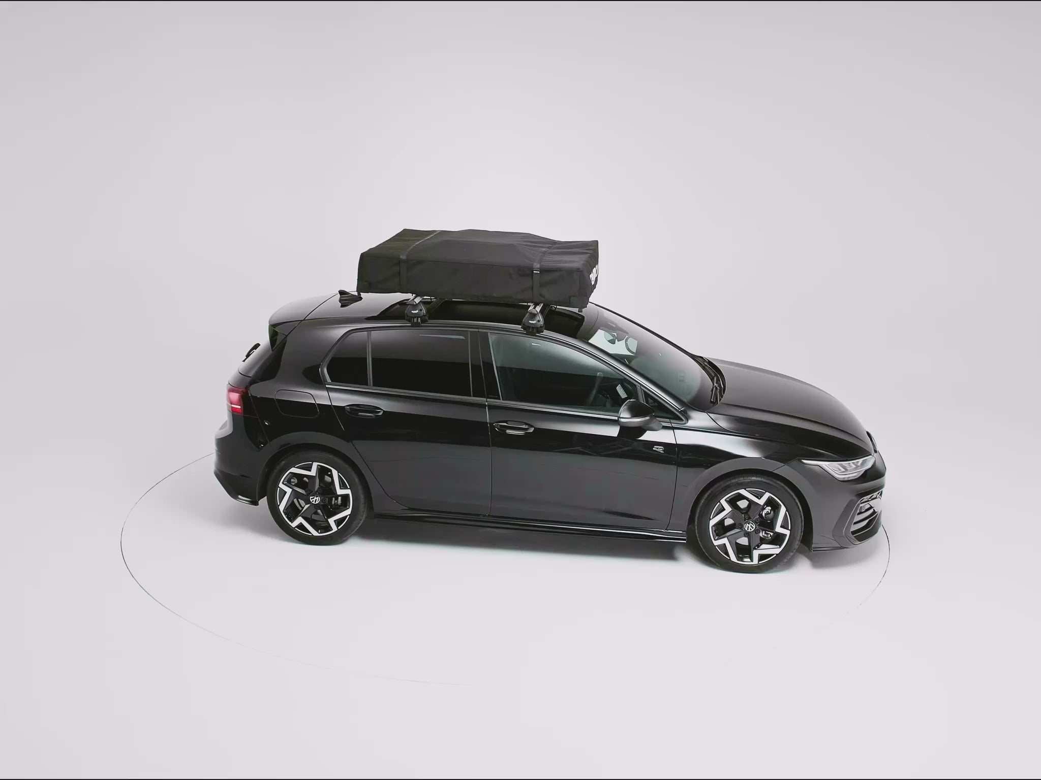A 360 video of the new TentBox Lite open and closed on top of a black car [autoplay]