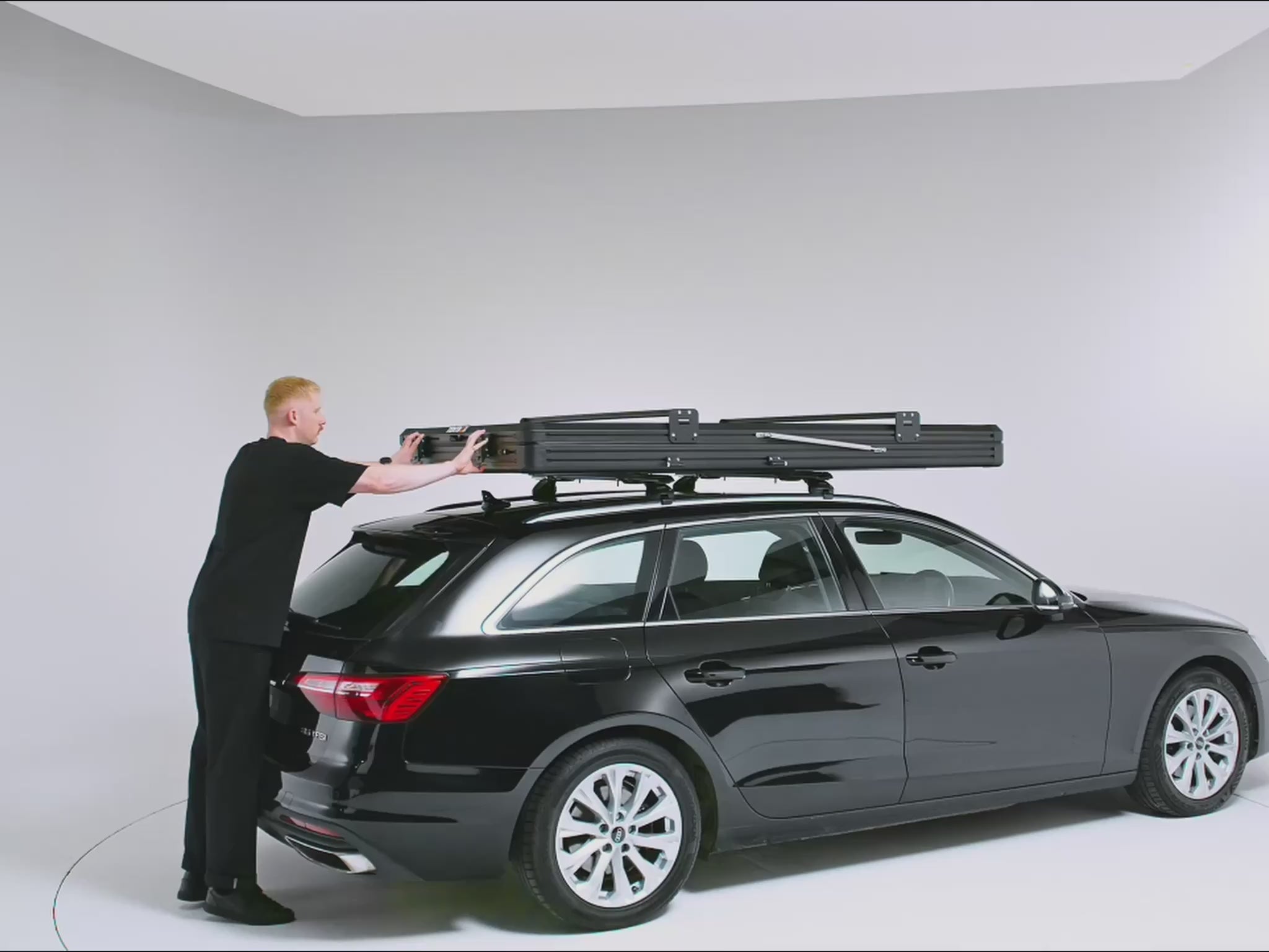 A 360 video of the  TentBox Cargo 2.0  roof tent being opened on top of a car [autoplay]